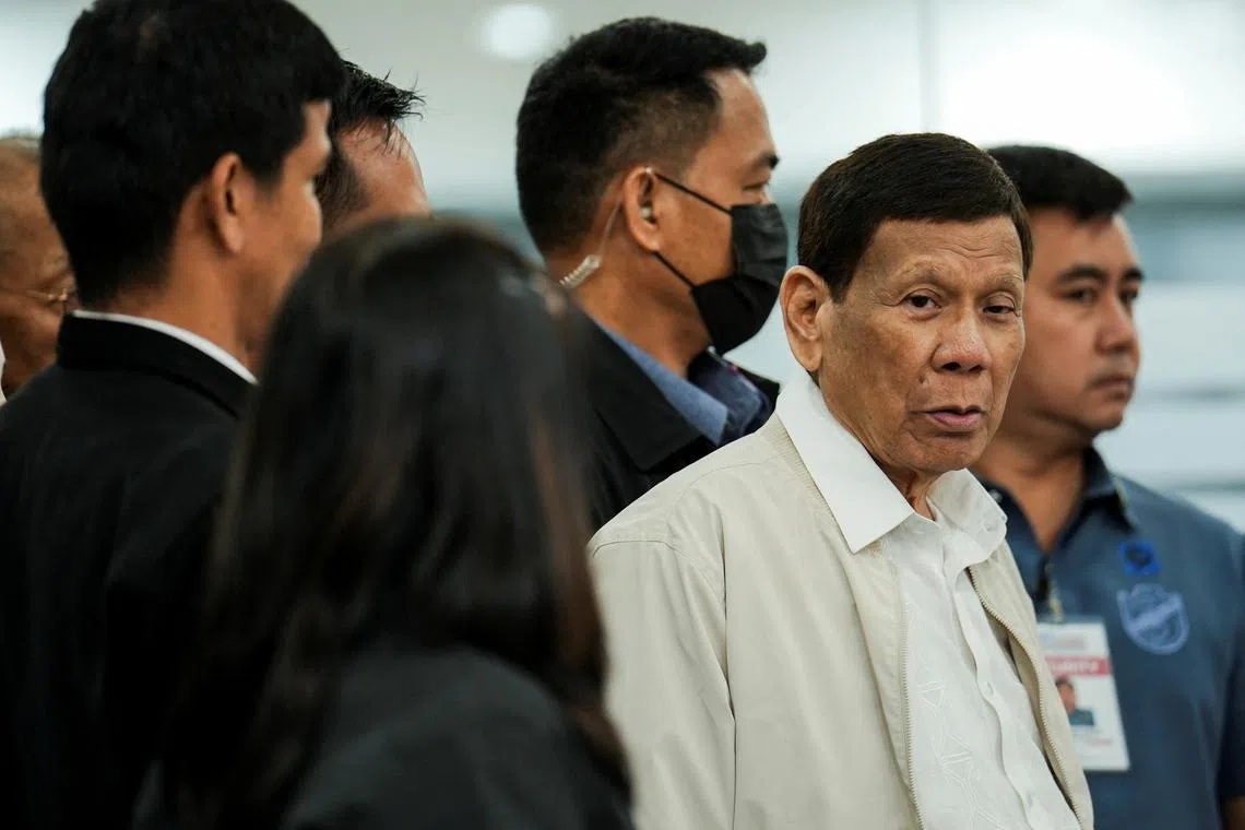 FILE PHOTO: Former Philippine President Rodrigo Duterte attends the House Quad Committee hearing investigating his administration's war on drugs, at the House of Representatives, in Quezon City, Metro Manila, Philippines, November 13, 2024. REUTERS/Lisa Marie David/ File Photo