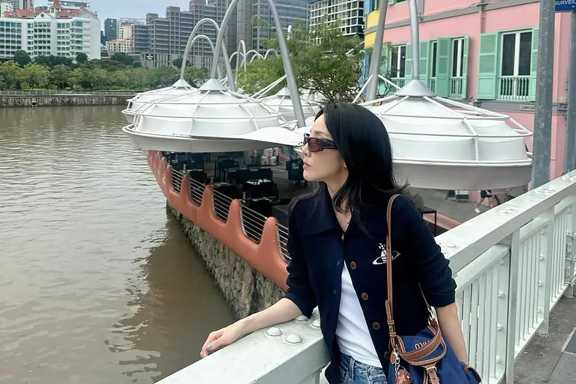 Dara on the iconic Read Bridge at Clarke Quay.