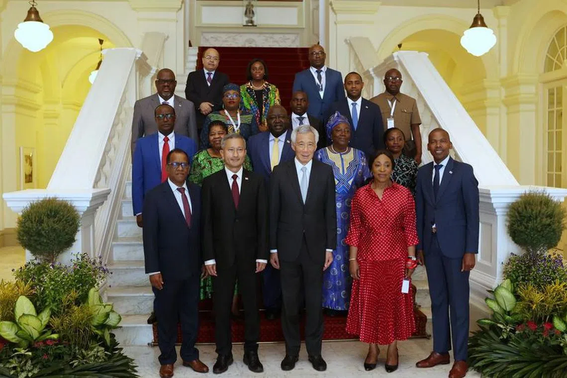 Prime Minister Lee Hsien Loong and Foreign Minister Vivian Balakrishnan join ministers and deputy ministers from eight Sub-Saharan African nations at the Istana. 