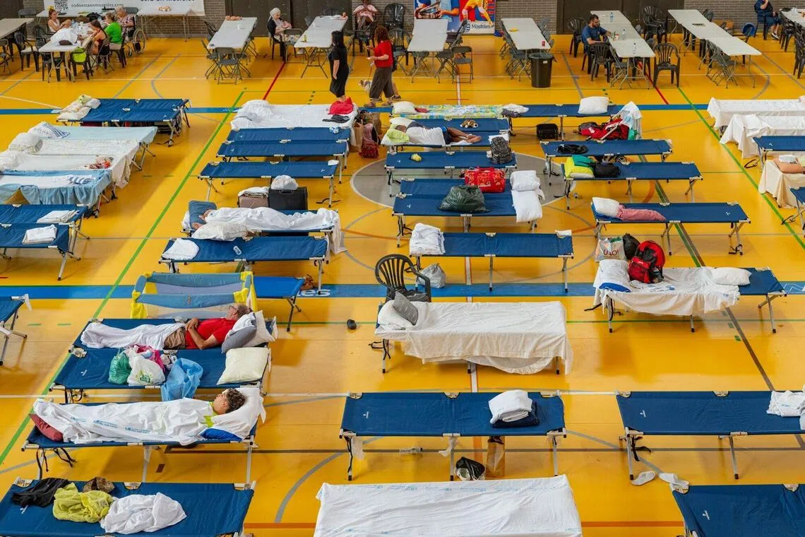 Beds for residents evacuated from wildfires in an emergency shelter set up at the Jose Sedano Municipal Complex in Mostoles, Spain, on July 28.