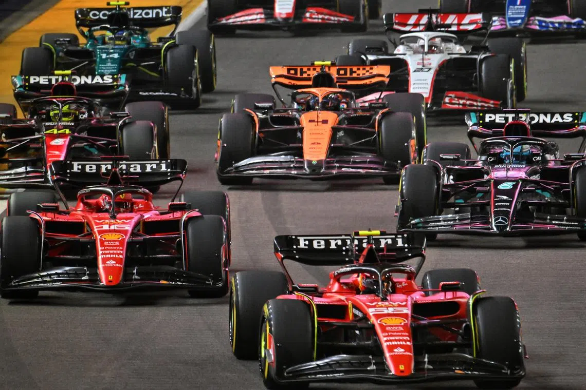 Carlos Sainz leading the pack during the Formula One Singapore Airlines Singapore Grand Prix at Marina Bay street circuit on Sept 17.