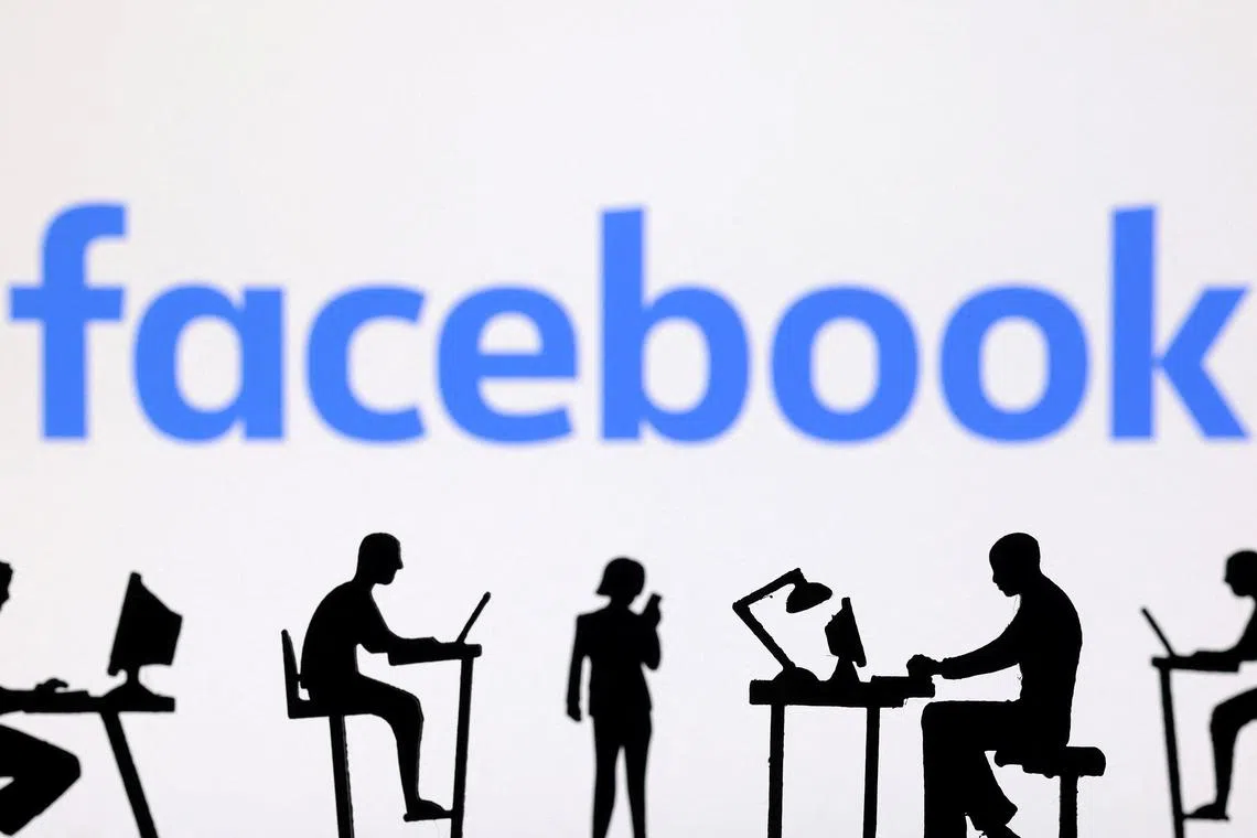 FILE PHOTO: Figurines with computers and smartphones are seen in front of Facebook logo in this illustration taken, February 19, 2024. REUTERS/Dado Ruvic/Illustration/File Photo