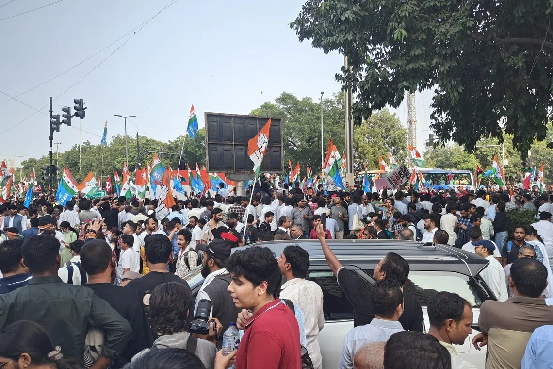 Tens of thousands of protesters gathered on Barakhamba Road in New Delhi on Oct 12.