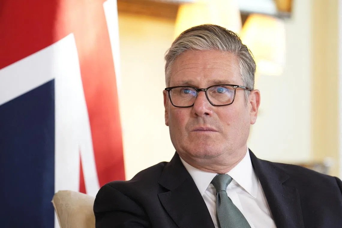 FILE PHOTO: British Prime Minister Keir Starmer looks on during his meeting with the Crown Prince of Bahrain, Prince Salman bin Hamad Al Khalifa (not in picture), ahead of bilateral talks at 10 Downing Street, London, Britain June 19, 2025.    Jordan Pettitt/Pool via REUTERS/File Photo