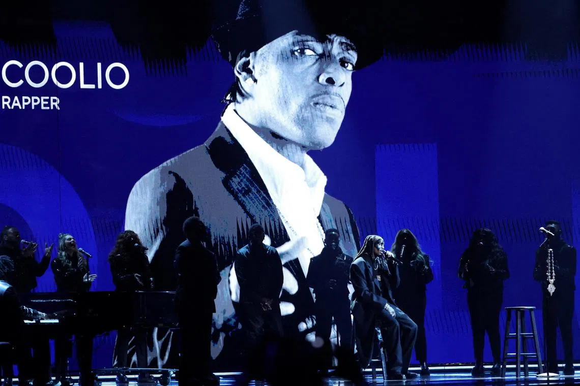 An image of the late rapper Coolio is shown onscreen, during a tribute at the Grammy Awards.