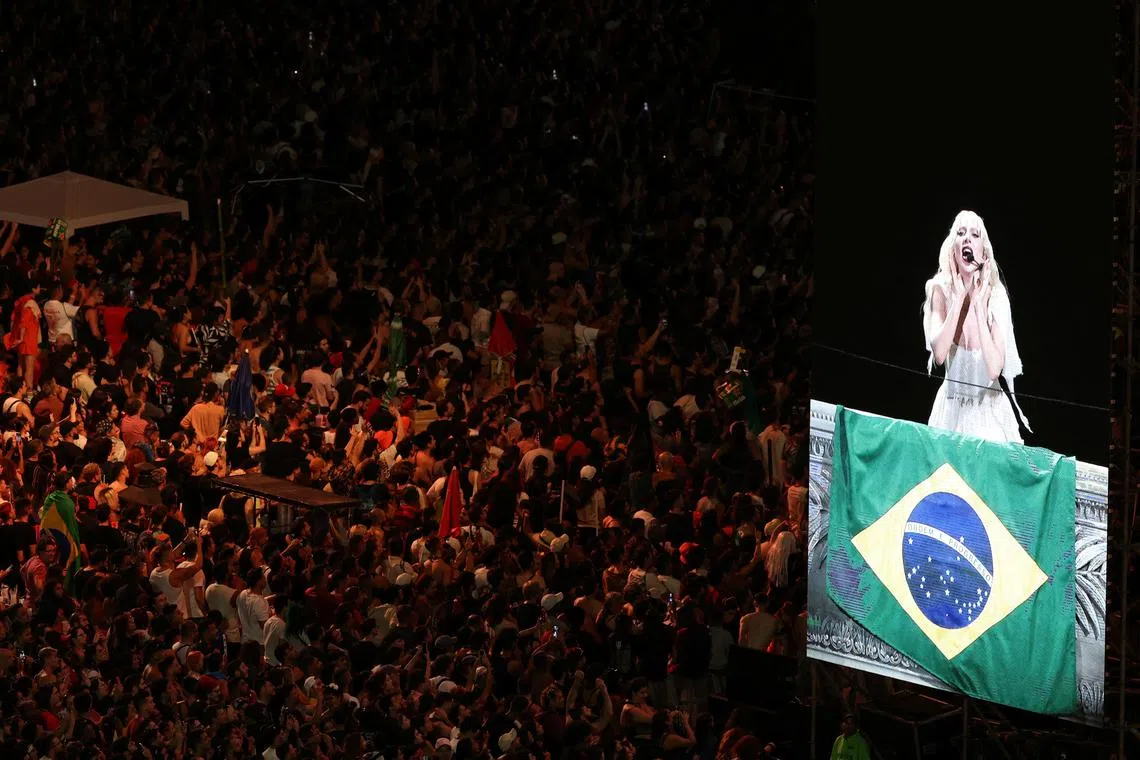 FILE PHOTO: People gather to attend the Lady Gaga's open concert, in Copacabana beach in Rio de Janeiro, Brazil May 3, 2025. REUTERS/Pilar Olivares/FIle Photo