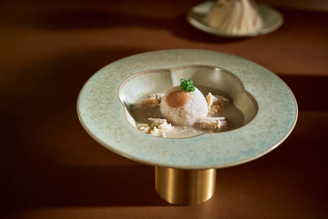 Pearl barley porridge with flower crab meat, Hokkaido dried scallops and kampong chicken stock.