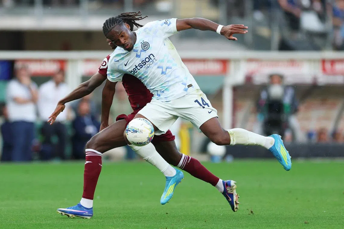 Soccer Football - Serie A - Torino v Inter Milan - Stadio Olimpico Grande Torino, Turin, Italy - April 26, 2026 Inter Milan's Ange-Yoan Bonny in action with Torino's Alieu Njie REUTERS/Claudia Greco/File Photo