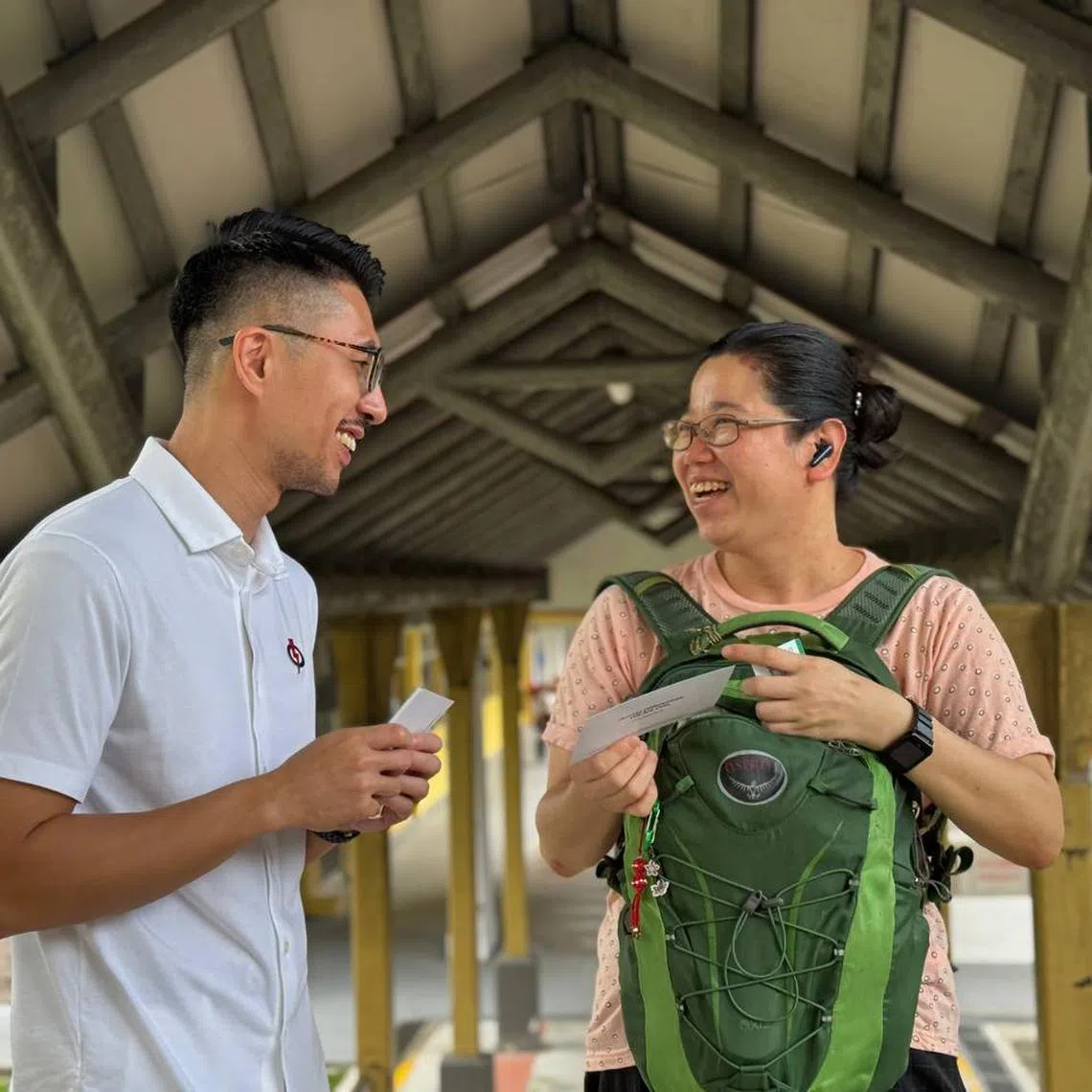 PAP candidate Marshall Lim introducing himself to a Hougang resident on April 24.