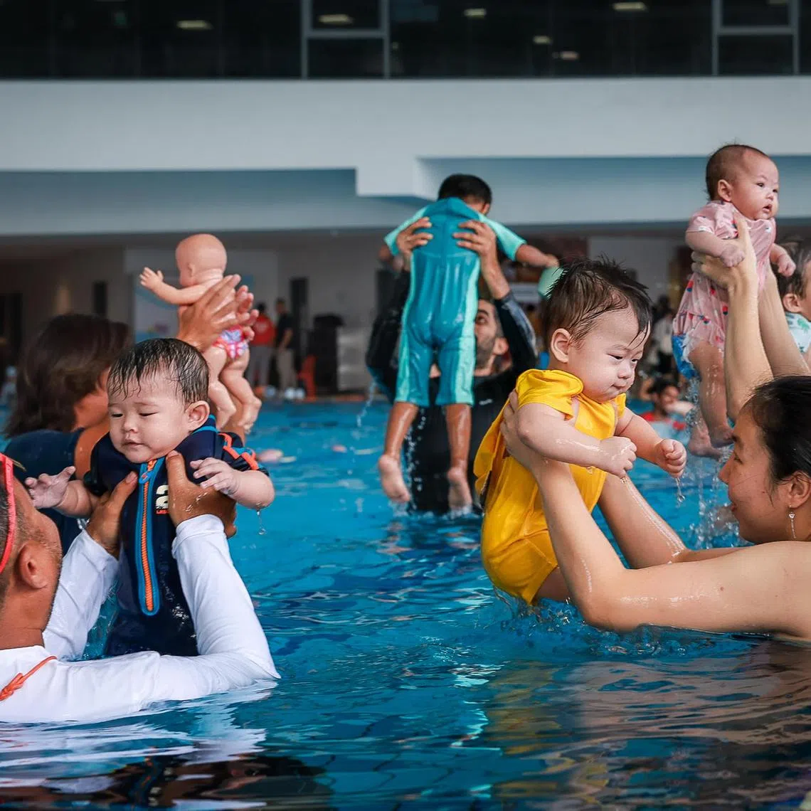 A SwimStart class being conducted at the launch of the new Swim Singapore framework held at Bedok ActiveSG Swimming Complex on July 5, 2025.