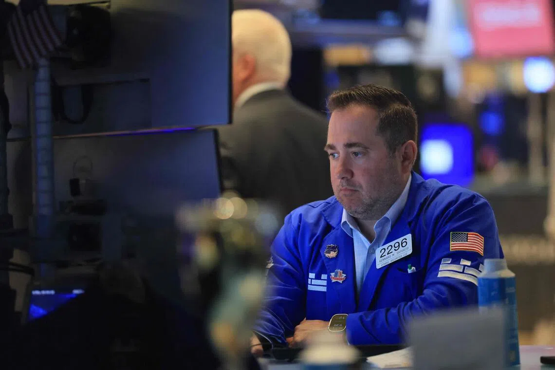 Traders working on the floor of the New York Stock Exchange on Sept 9, in New York City.