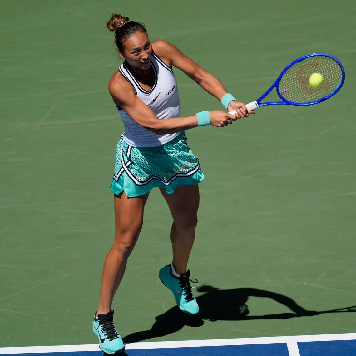 China’s Zheng Qinwen Zheng hitting the ball in her US Open round-of-16 match against Polish star Iga Swiatek (not pictured).