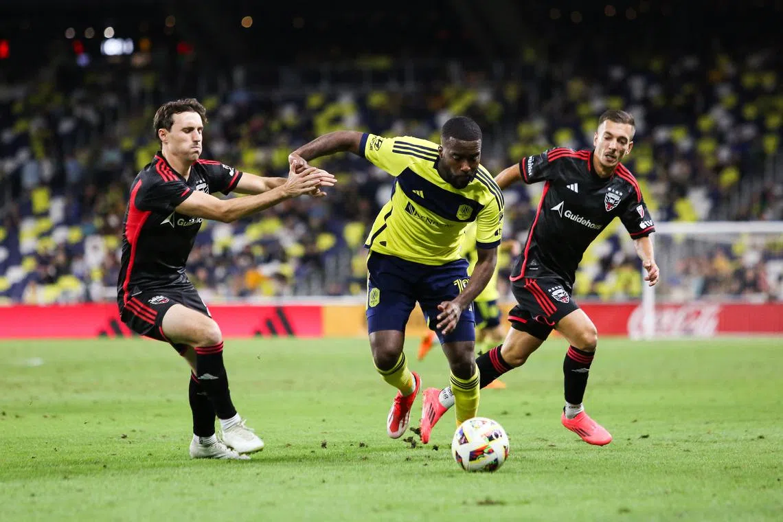 FILE PHOTO: Oct 2, 2024; Nashville, Tennessee, USA; Nashville SC defender Shaq Moore (18) controls the ball during the second half at Geodis Park. Mandatory Credit: Kindell Buchanan-Imagn Images/File photo