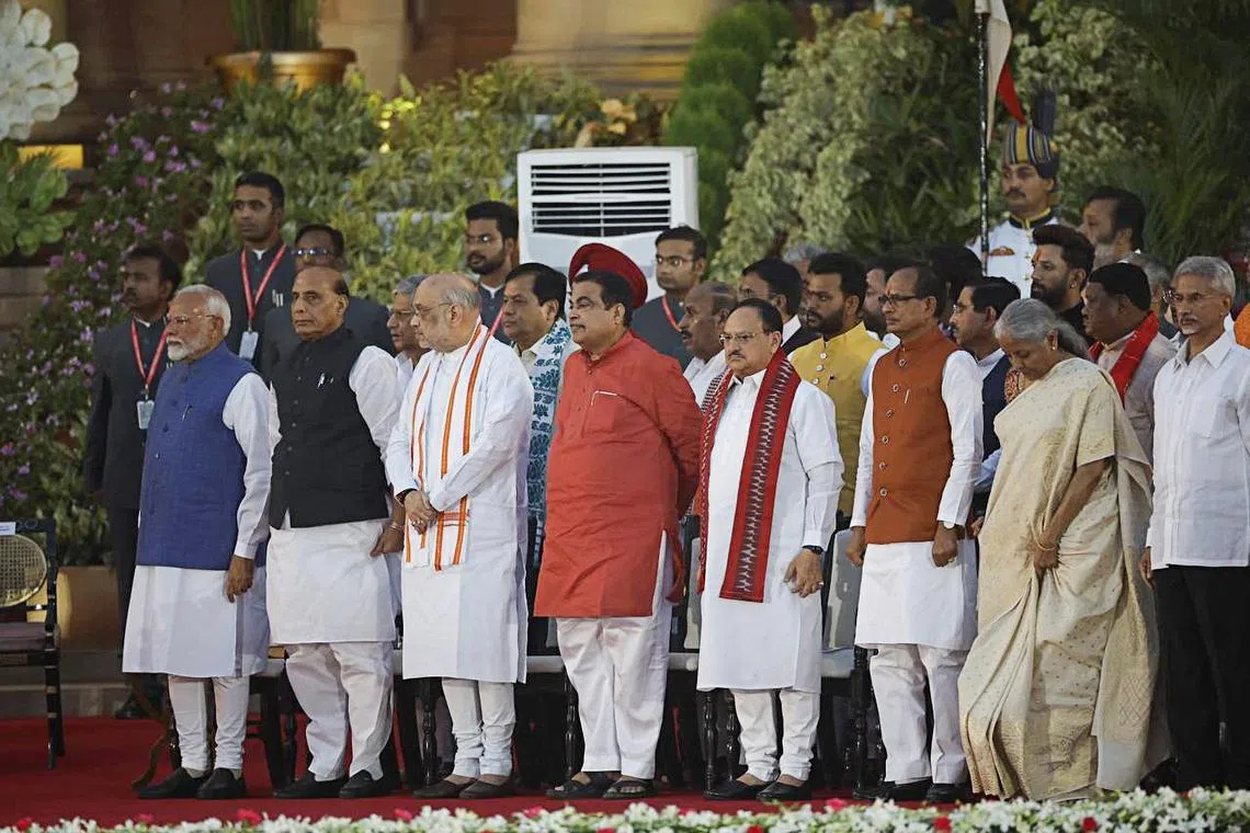 India's Prime Minister Narendra Modi, Nitin Gadkari and Amit Shah attend the swearing-in ceremony at the presidential palace in New Delhi, India, June 9, 2024. REUTERS/Adnan Abidi