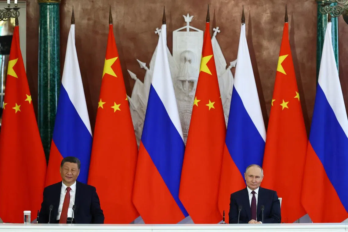 Russian President Vladimir Putin and his Chinese counterpart Xi Jinping attend a signing ceremony following their talks at the Kremlin in Moscow, Russia, May 8, 2025. REUTERS/Evgenia Novozhenina