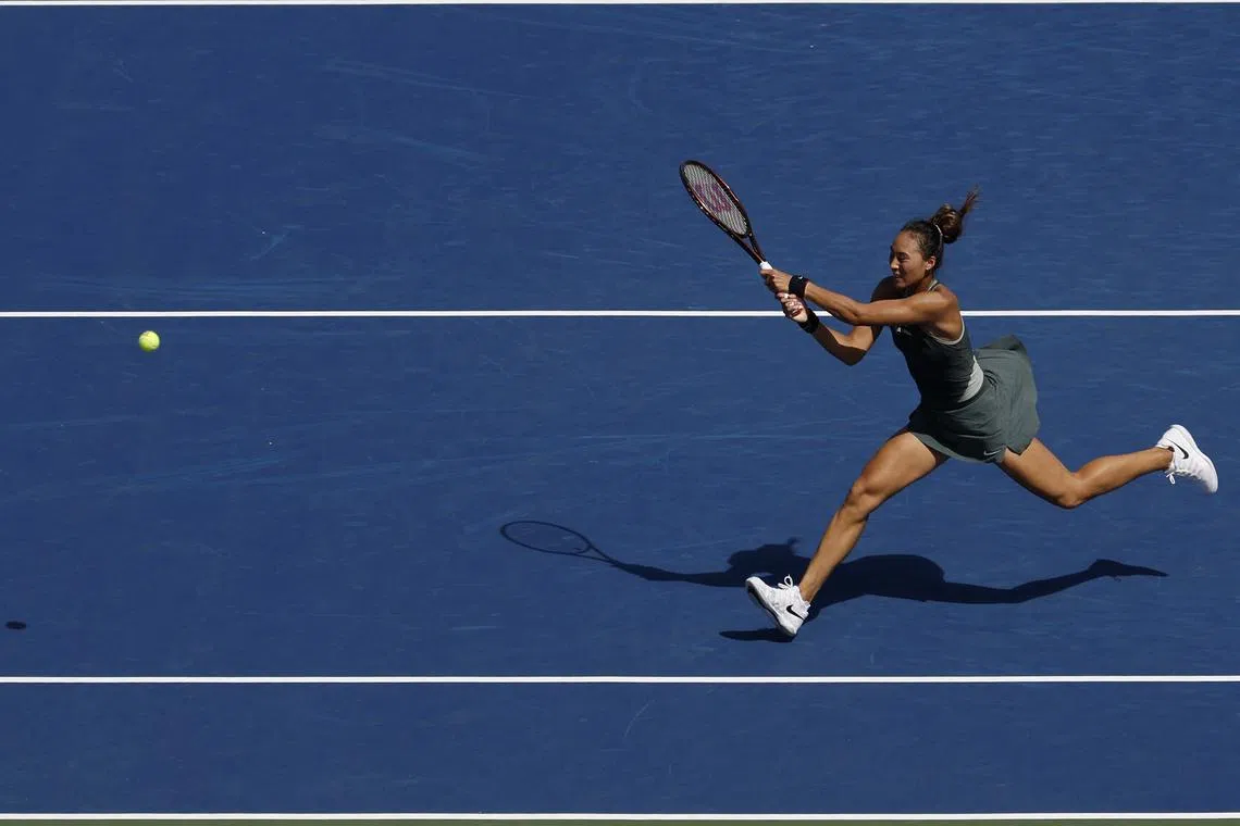 FILE PHOTO: Aug 28, 2024; Flushing, NY, USA; Qinwen Zheng (CHN) hits a backhand against Erika Andreeva (not pictured) in a women's singles match on day three of the U.S. Open tennis tournament at USTA Billie Jean King National Tennis Center. Mandatory Credit: Geoff Burke-USA TODAY Sports/File Photo