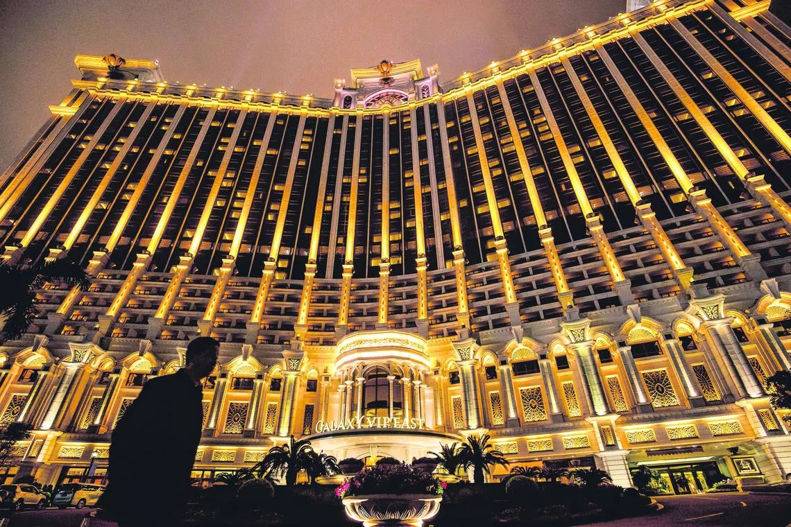 The Galaxy Macau casino and hotel, developed by Galaxy Entertainment Group Ltd., stands illuminated at night in Macau, China, on Tuesday, Feb. 19, 2019. Galaxy is scheduled to release annual earnings on Feb. 28. Photographer: Paul Yeung/Bloomberg