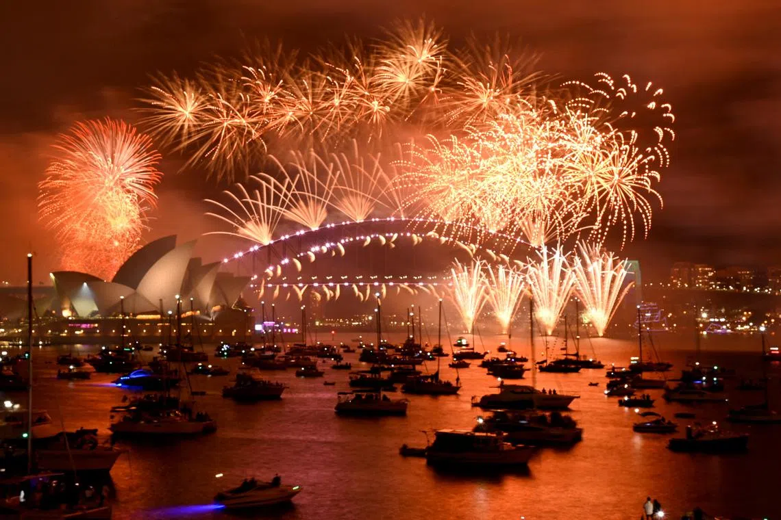 Fireworks explode over Sydney Harbour during the New Year's Eve celebrations in Sydney, Australia, Jan 1, 2023. 