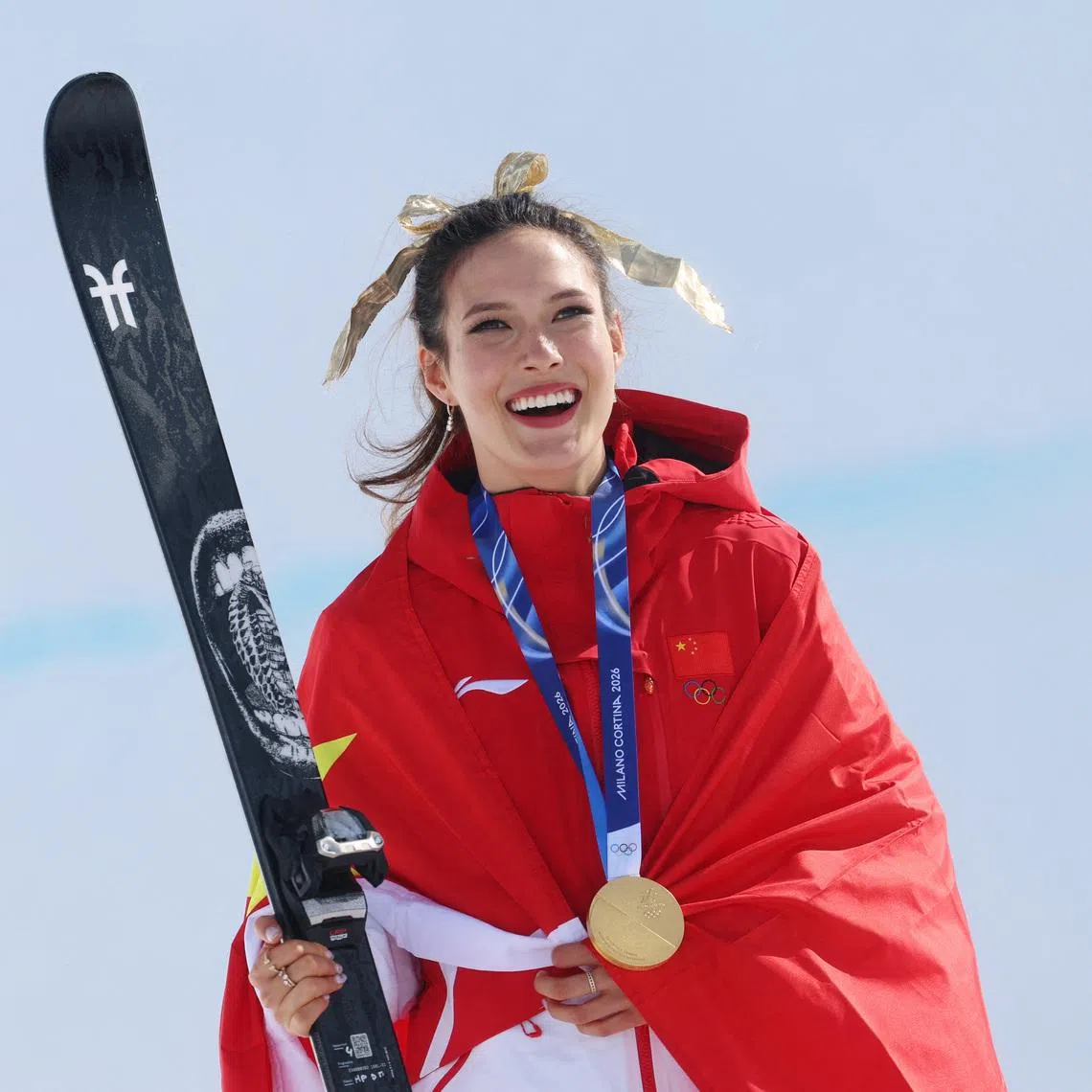 Milano Cortina 2026 Olympics - Freestyle Skiing - Women's Freeski Halfpipe Victory Ceremony - Livigno Snow Park, Livigno, Italy - February 22, 2026. Gold medallist Ailing Eileen Gu of China celebrates during the women's freeski halfpipe victory ceremony REUTERS/Hannah Mckay