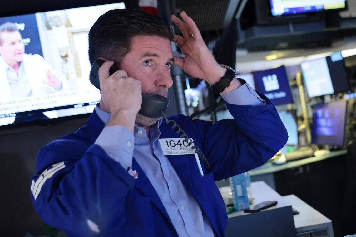 Traders working on the floor of the New York Stock Exchange on April 13, in New York City.