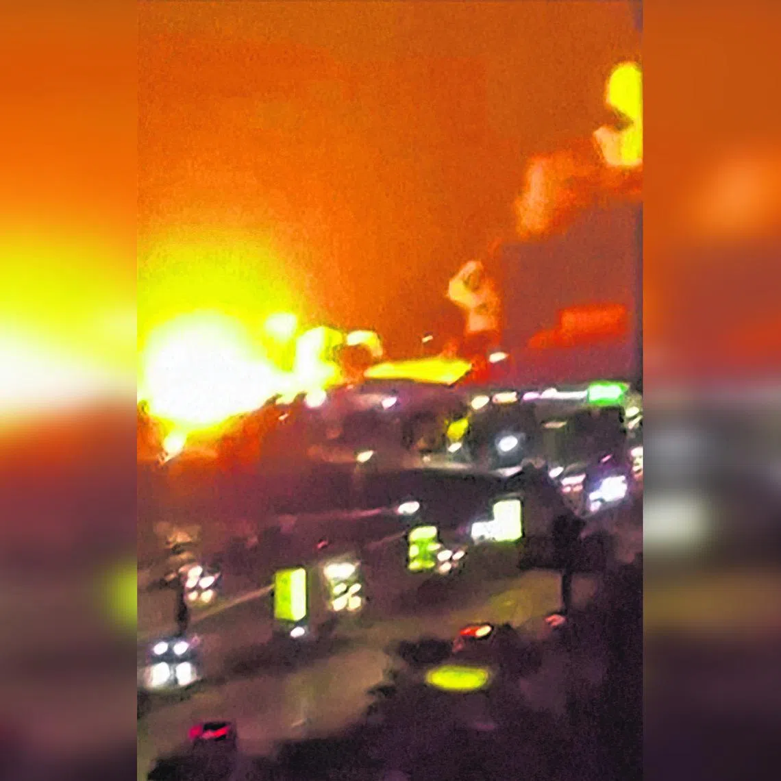 A video frame grab shows explosions going off in Iran‘s major port city of Bandar Abbas.