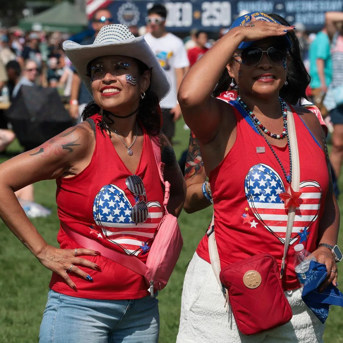 People attend the Great American State Fair during ‘Salute to America 250’ Fourth of July celebrations on the National Mall in Washington, D.C.
