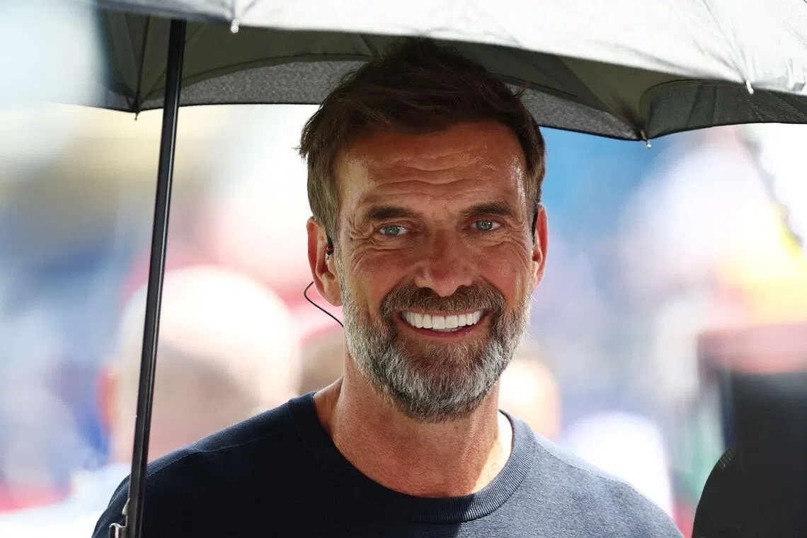 (FILES) German coach Jurgen Klopp attends the 2026 World Cup football tournament quarter-final match between France and Morocco at Boston Stadium in Foxborough on July 9, 2026. The German Football Federation (DFB) announced on July 11, 2026 that it was close to an agreement with Jurgen Klopp for him to become the new Germany coach. However, before the 59-year-old makes his return to the touchline, the DFB said it still needed to secure the approval of his current employer, the Red Bull Group. (Photo by FRANCK FIFE / AFP)