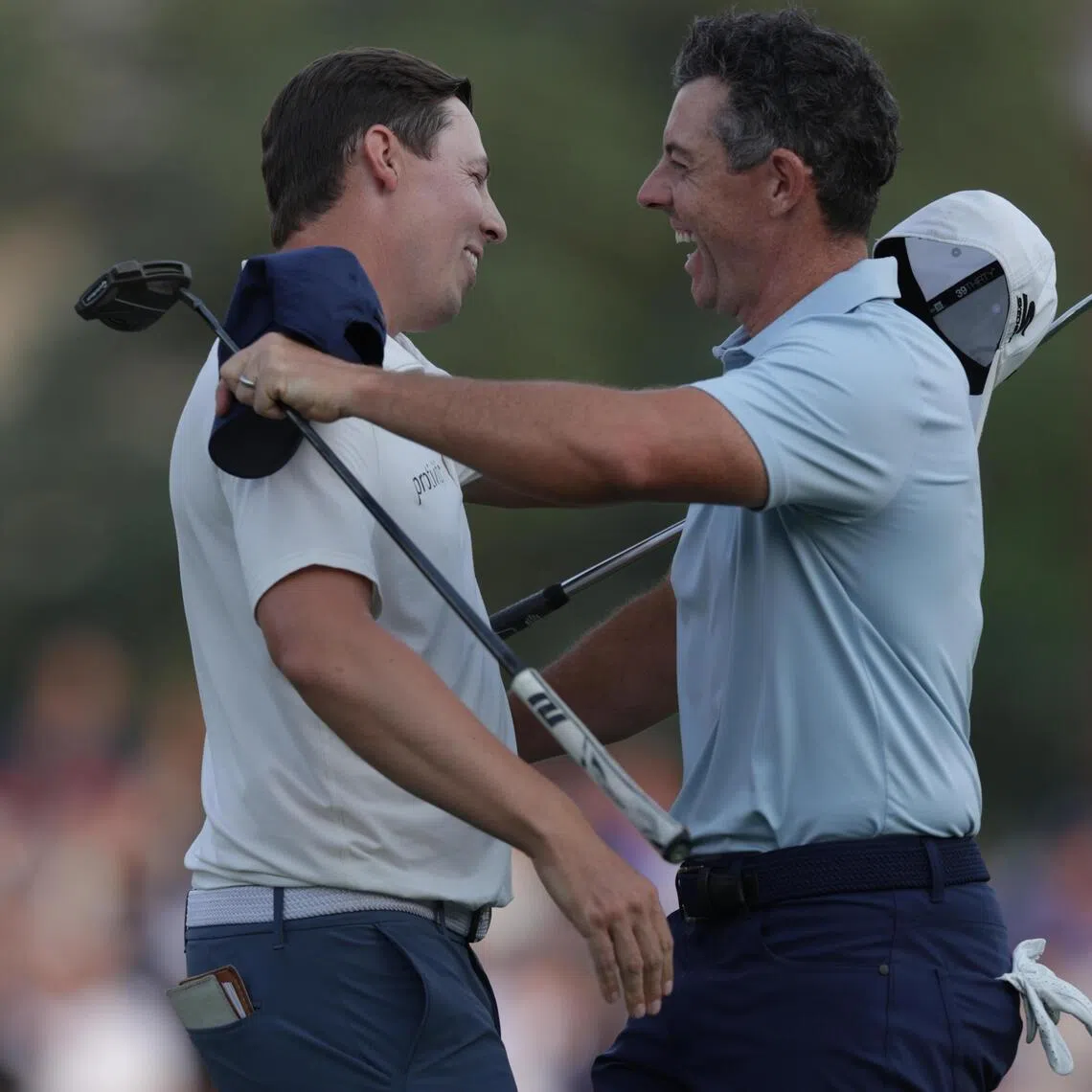 Matt Fitzpatrick of England hugs Rory McIlroy of Northern Ireland after the final round of the DP World Tour Championship.