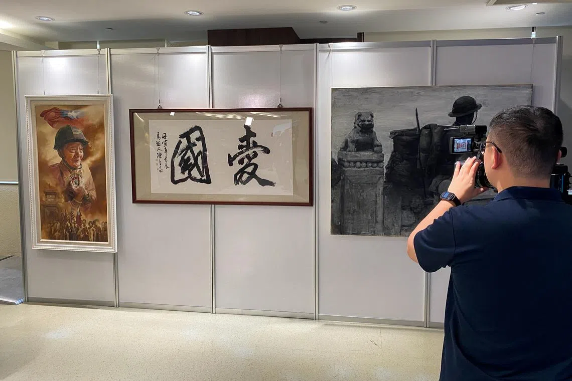Paintings on display at Taiwan's defence ministry, which will be used in exhibitions for the 80th anniversary of the end of World War Two, in Taipei, Taiwan March 26, 2025. REUTERS/Ben Blanchard