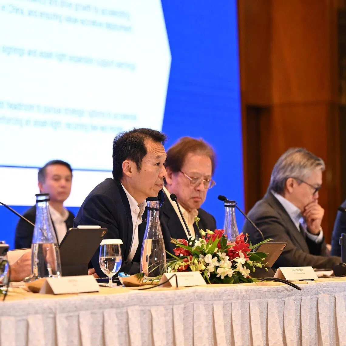 CapitaLand Investment CEO Lee Chee Koon (centre) said there is no perfect deal, and CLI would assess how it can address any shortcomings in a company it acquires.