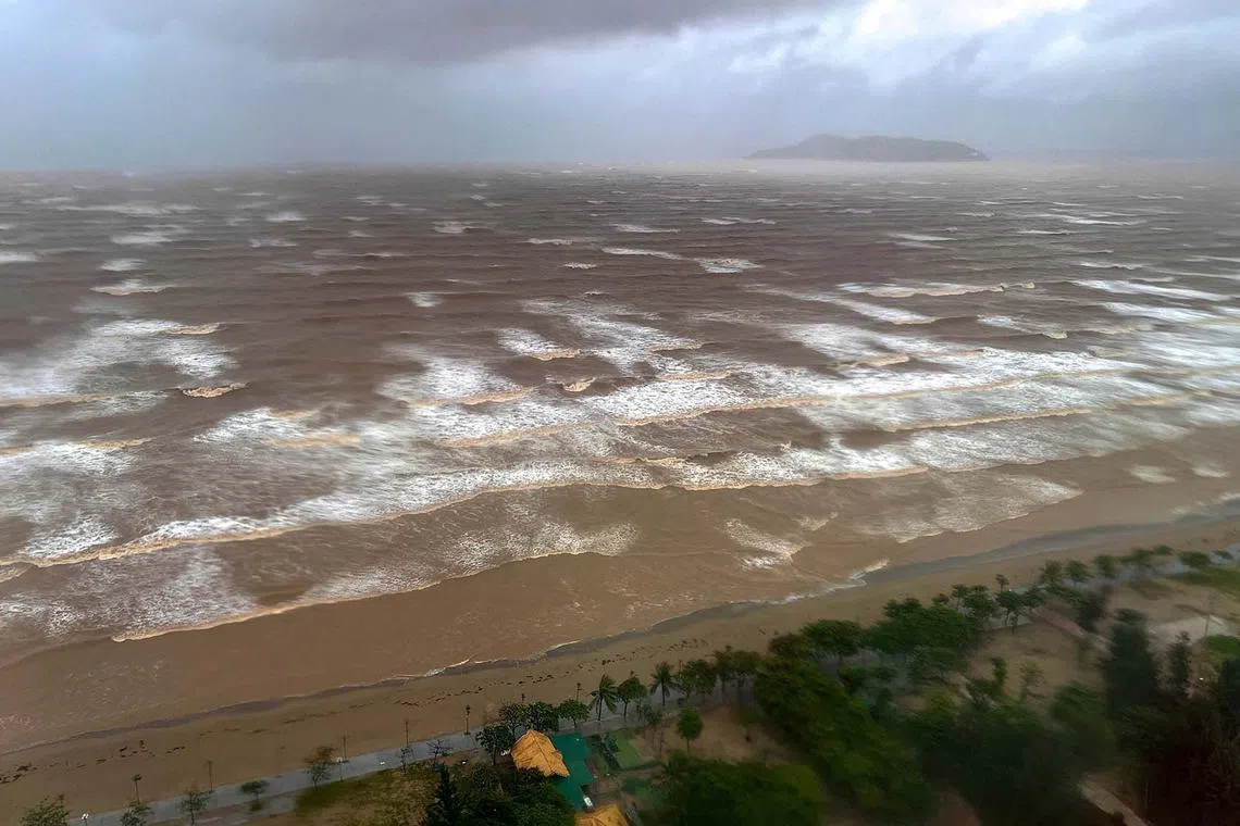 Waves approach Cua Lo beach, as seen through a window, while Typhoon Kajiki approaches in Nghe An province, Vietnam, August 25, 2025. REUTERS/Minh Nguyen TPX IMAGES OF THE DAY