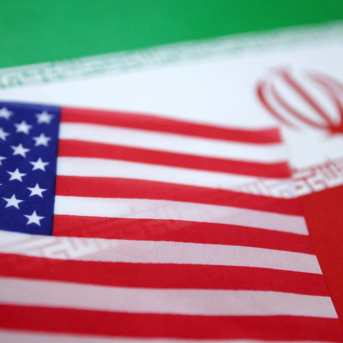 U.S. and Iran flags are seen in this illustration taken June 18, 2025. REUTERS/Dado Ruvic/Illustration