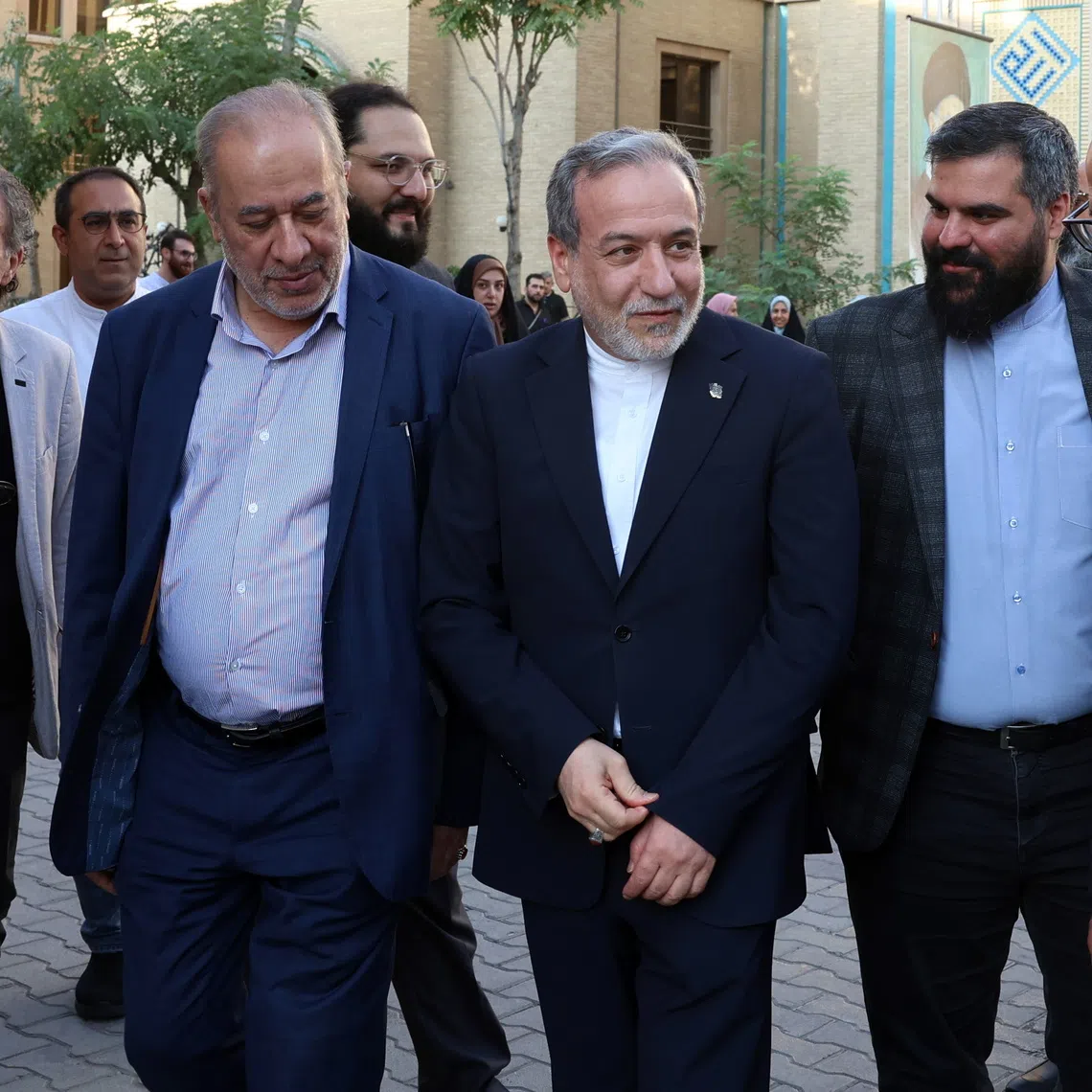Iranian foreign minister Abbas Araghchi (centre) visiting an art exhibition dedicated to the victims of Minab School, which was destroyed in a US attack at the beginning of the war, in Tehran, on Aug 28.