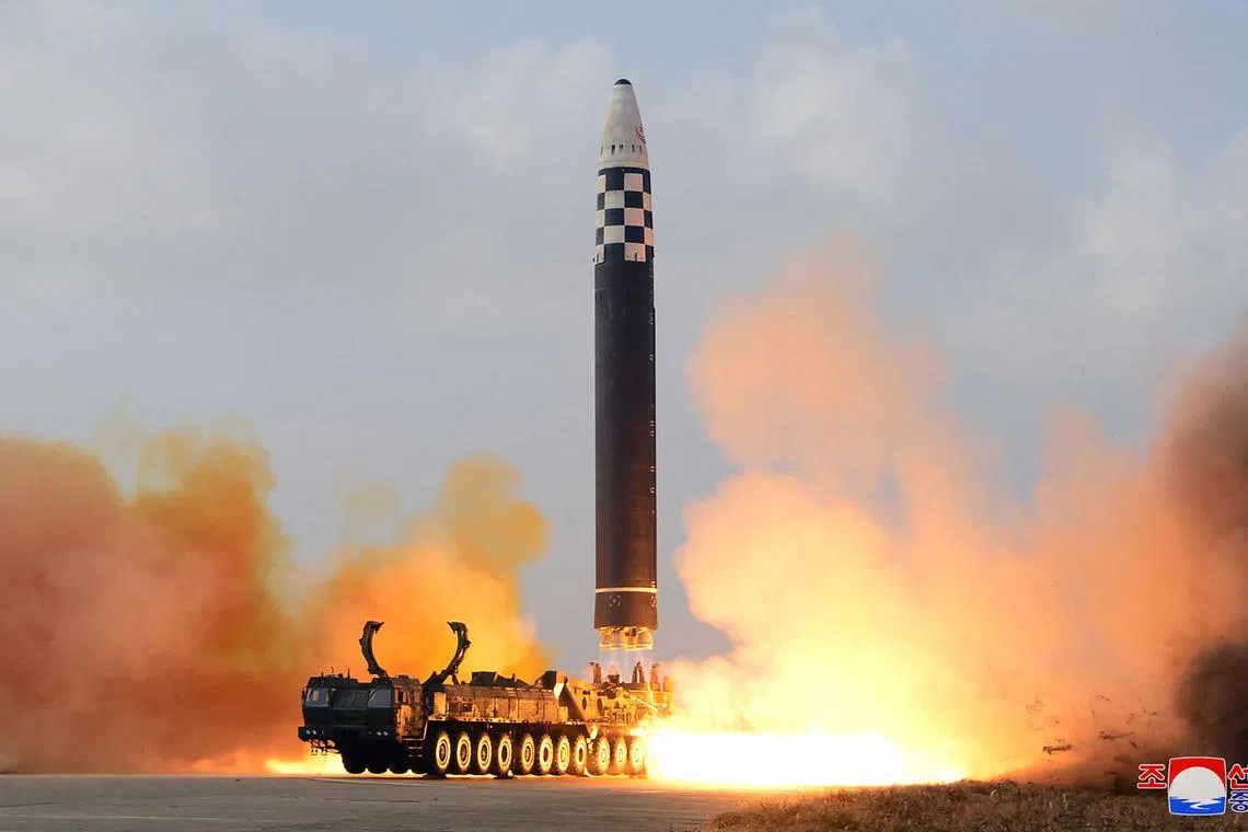 This picture taken on Nov 18, 2022 shows the launch of North Korea's new intercontinental ballistic missile (ICBM) "Hwasong Gun 17", at Pyongyang International Airport. 