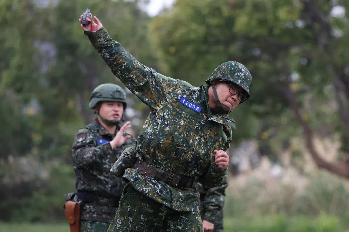 Training at an army base in Hsinchu, February 6, 2024. REUTERS/Ann Wang