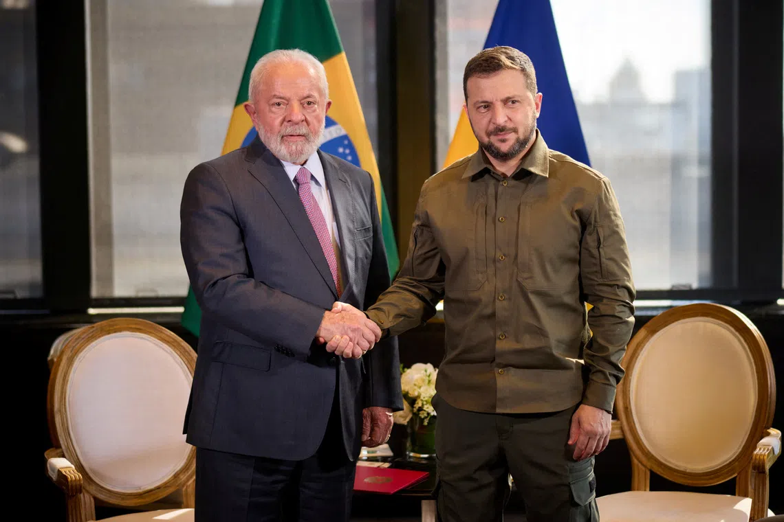 FILE PHOTO: Ukraine's President Volodymyr Zelenskiy and Brazil's President Luiz Inacio Lula da Silva shake hands before their meeting on the sidelines of the 78th Session of the U.N. General Assembly in New York City, U.S., September 20, 2023. Ukrainian Presidential Press Service/Handout via REUTERS/File Photo