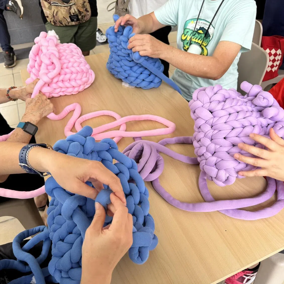 kfcrochet - The Silver Yarns project organised by NYCrochers, involved student volunteers teaching the elderly how to crochet. 

CREDIT: KAELYN FONG