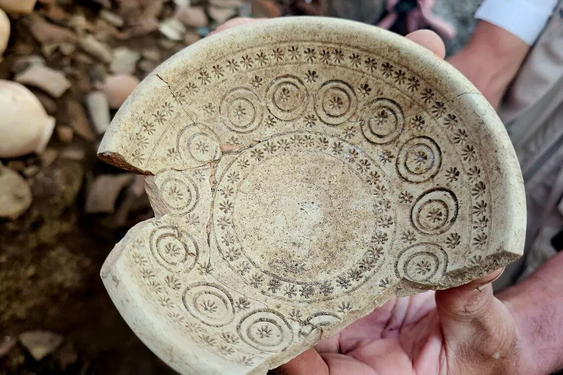 Roadworks in Georgia's capital uncover rare 10th-century pottery cache