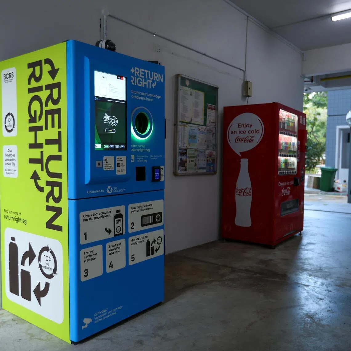 One of the reverse vending machines that accept used drink containers carrying the “10c SG Return” logo, at an HDB void deck in Admiralty.