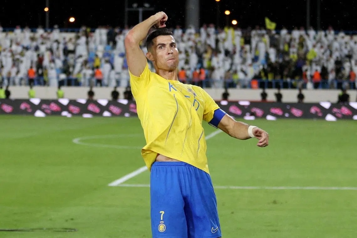 FILE PHOTO: Soccer Football - Saudi Pro League - Al Okhdood v Al Nassr - Prince Hathloul Sports City Stadium, Najran, Saudi Arabia - May 9, 2024 Al Nassr's Cristiano Ronaldo celebrates after the match REUTERS/Stringer/File Photo