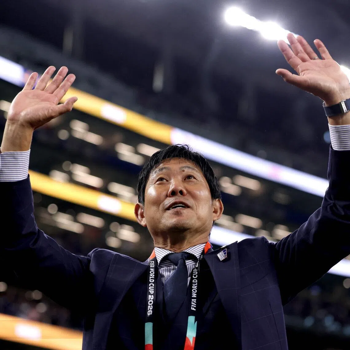 Japan coach Hajime Moriyasu acknowledging fans after the 1-1 World Cup draw against Sweden at AT&T Stadium in Texas on June 25.