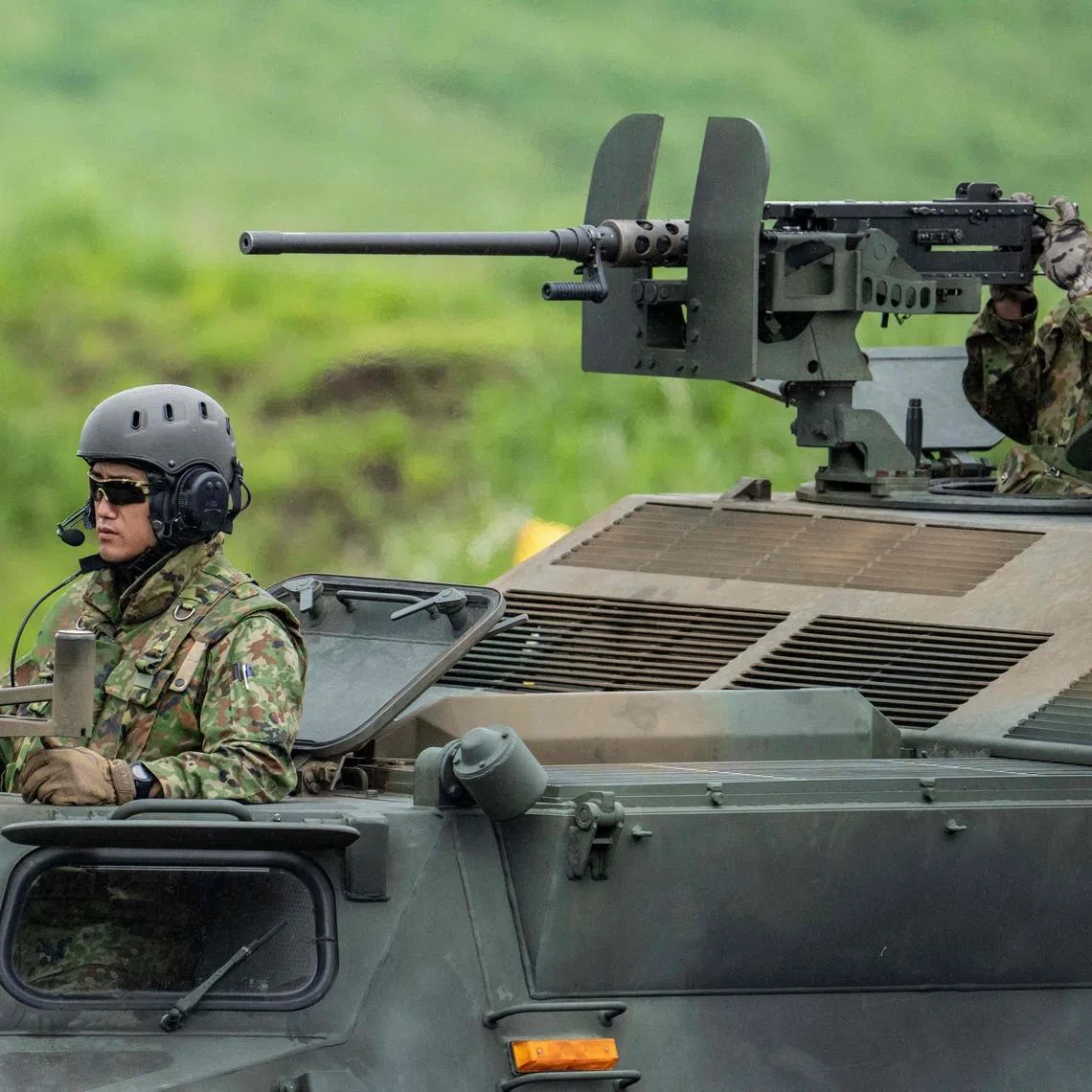 Japan Ground Self-Defense Force soldiers take part in a live fire exercise at East Fuji Maneuver Area in Gotemba on June 7.