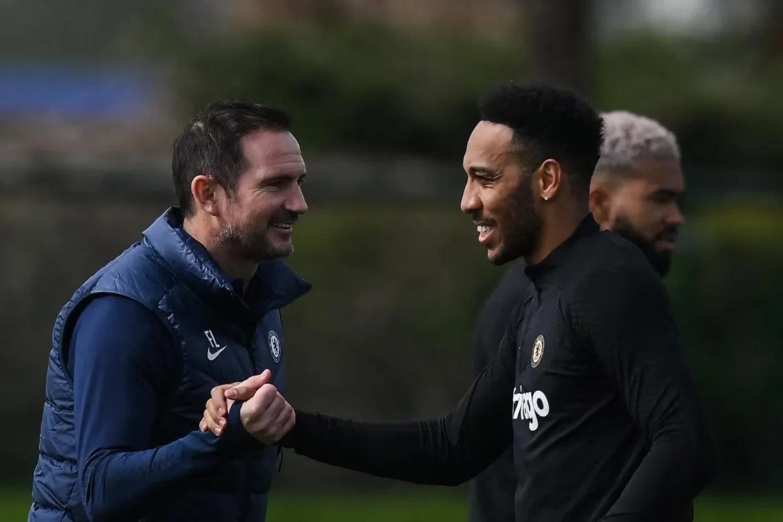Chelsea's caretaker manager Frank Lampard (left) and Gabonese striker Pierre-Emerick Aubameyang, during a team training session.