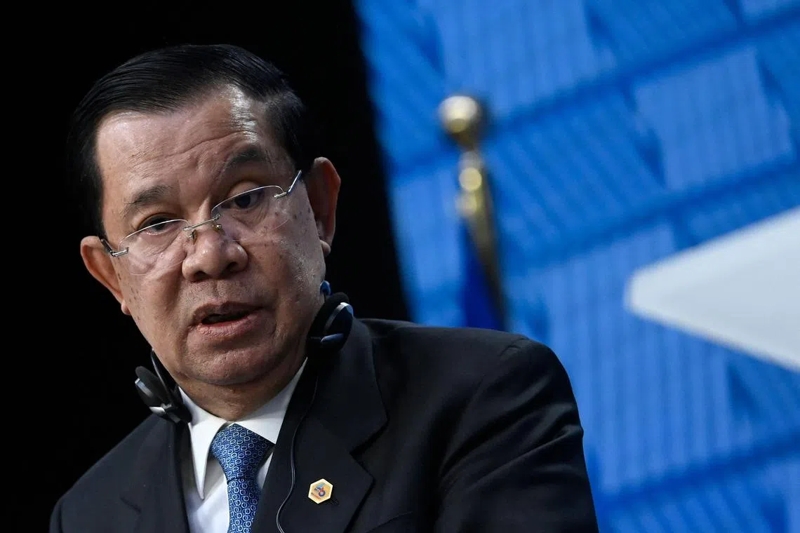 (FILES) In this file photo taken on December 14, 2022 Cambodian Prime minister Hun Sen speaks at a press conference during the EU-ASEAN (Association of Southeast Asian Nations) summit at the European Council headquarters in Brussels. - Cambodian premier Hun Sen warned his political opponents January 9, 2023 they could face legal action or "sticks" for criticising his ruling party as he prepares for national polls later this year. (Photo by John THYS / AFP)