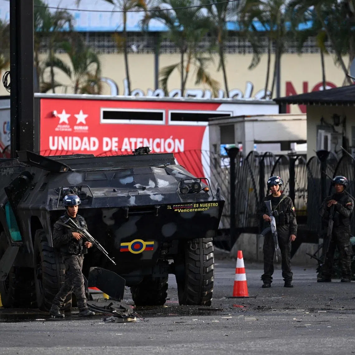 Members of the National Guard stand guard at Venezuela's largest military complex in Caracas on Jan 3, after US forces captured Venezuelan leader Nicolas Maduro following a "large-scale strike" on the country.