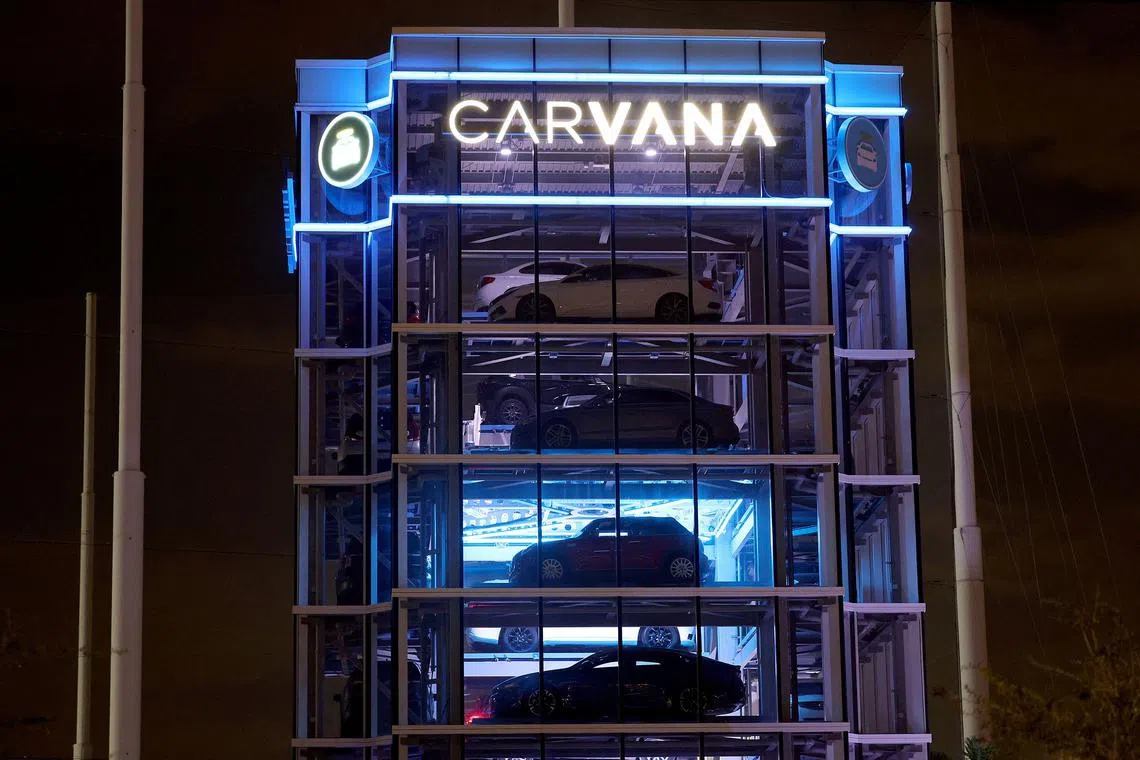 A Carvana used-car "vending machine" in Miami, Florida. Eighteen months ago, Carvana had such great prospects that it was worth US$80 billion. Now, it is valued at less than US$1.5 billion