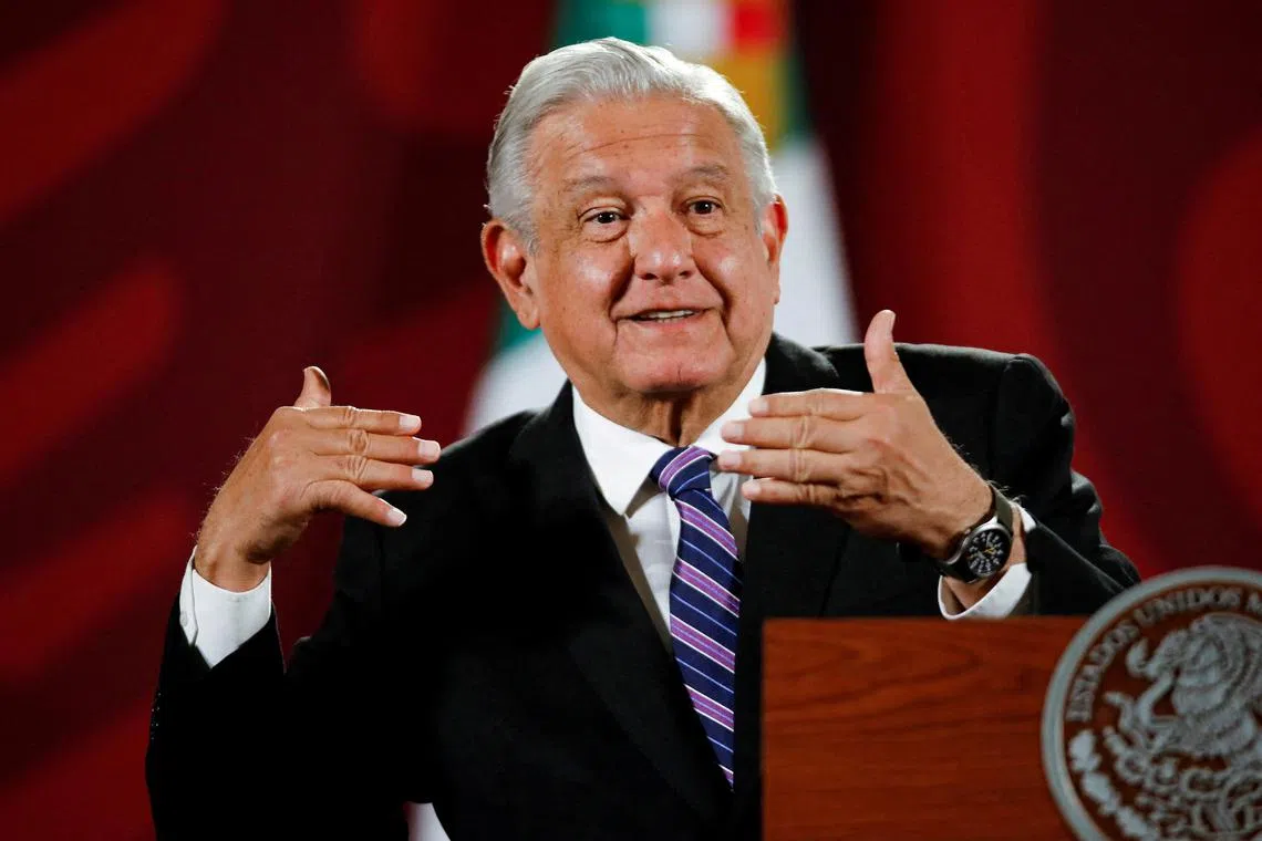 FILE PHOTO: Mexican President Andres Manuel Lopez Obrador gestures during a news conference at the National Palace in Mexico City, Mexico April 11, 2022. REUTERS/Gustavo Graf/File Photo