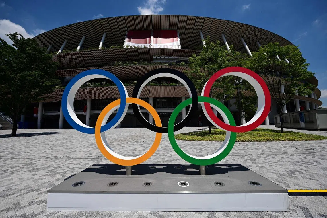 This general view shows the Olympic Rings at the Olympic Stadium, main venue of the Tokyo 2020 Olympic Games in Tokyo on July 19, 2021. The lessons Pierre Trochet learned when aged just 20 a business he started up "crashed" served him well as within two decades he succeeded in securing Flag Football a spot at the 2028 Summer Olympics in Los Angeles.