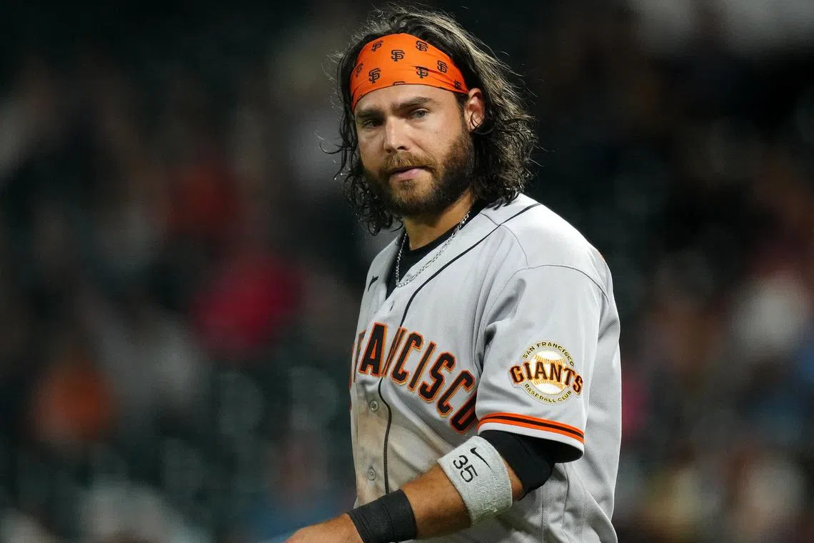 FILE PHOTO: Jun 6, 2023; Denver, Colorado, USA; San Francisco Giants shortstop Brandon Crawford (35) reacts after striking out in the sixth inning against the Colorado Rockies at Coors Field. Mandatory Credit: Ron Chenoy-USA TODAY Sports/File Photo