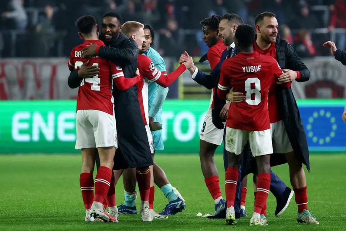 Soccer Football - Champions League - Group H - Royal Antwerp v FC Barcelona - Bosuilstadion, Antwerp, Belgium - December 13, 2023 Royal Antwerp's Jelle Bataille celebrates with teammates after the match REUTERS/Yves Herman